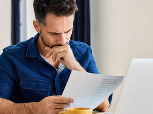 Man looking at his loan application